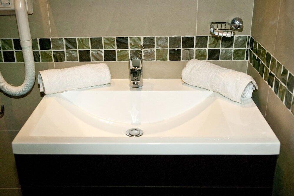 Foto del baño de Porto Azzurro Aparthotel