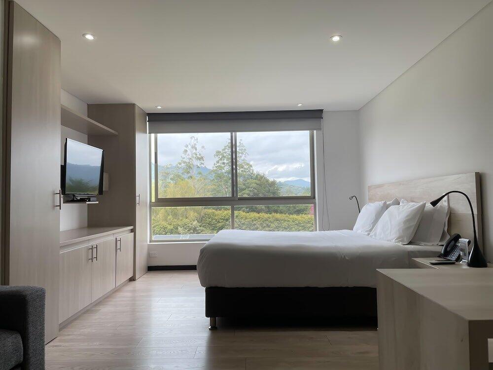 Foto de una habitación de MG Hotels &amp;amp; Suites
