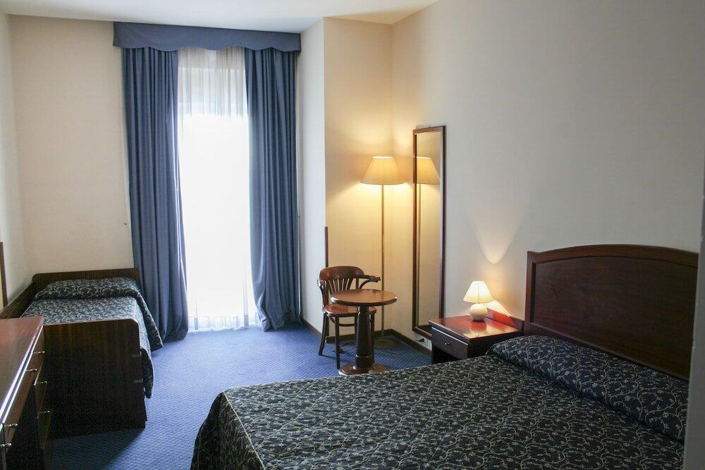 Foto de una habitación de Hotel Mediterraneo