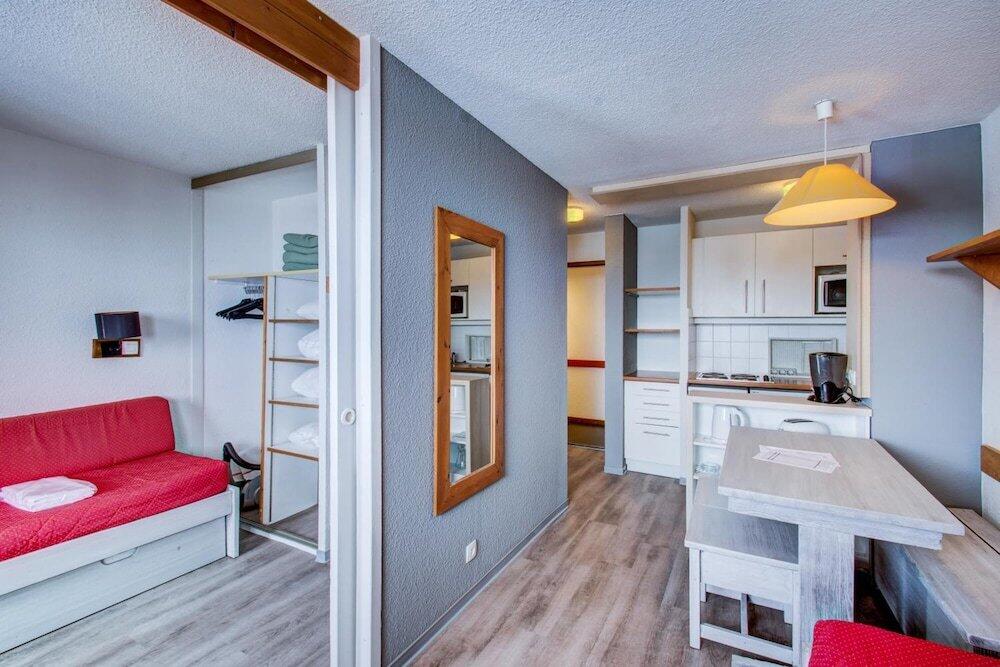 Foto de una habitación de Apartamentos Vacancéole - Le Borsat IV