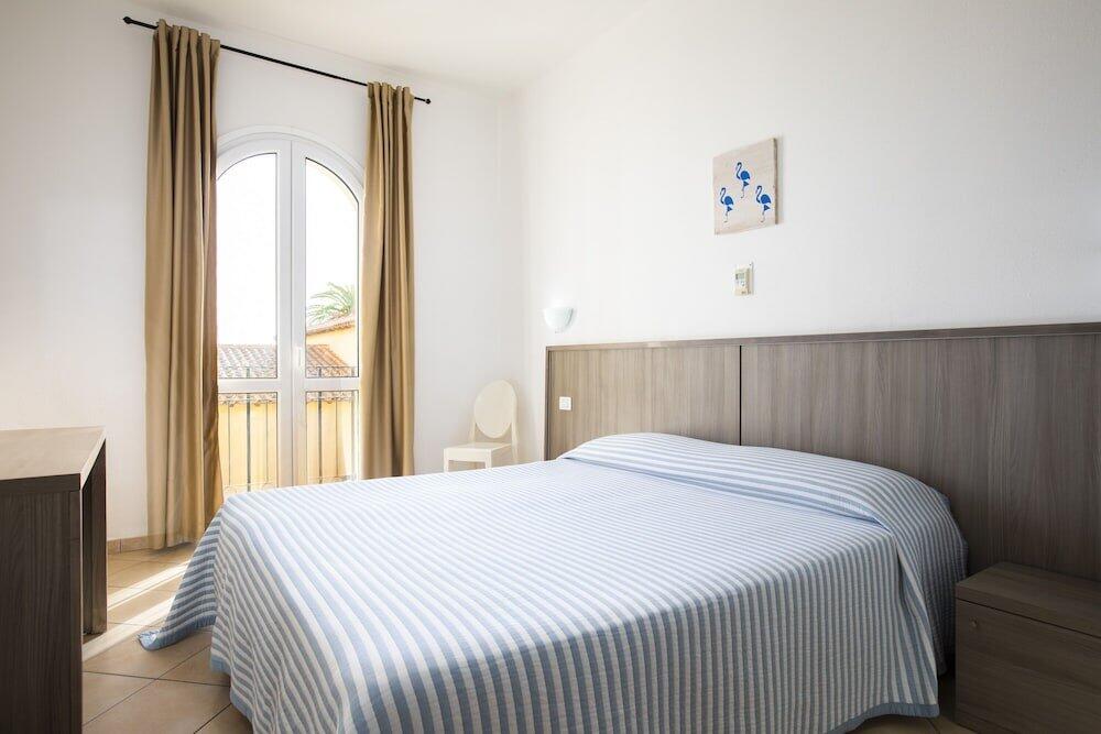 Foto de una habitación de MuMA Hostel