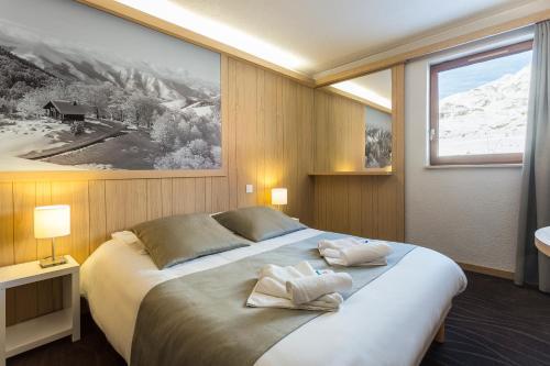 Foto de una habitación de Hôtel Club mmv Les Bergers ****