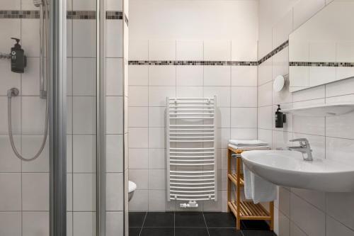 Foto del baño de Hotel Amedia Express Bielefeld, Trademark Collection by Wyndham