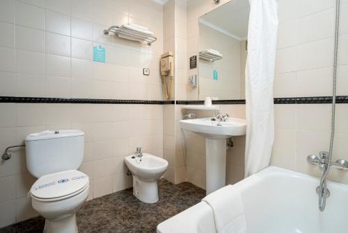 Foto del baño de Hotel Alda El Pasaje