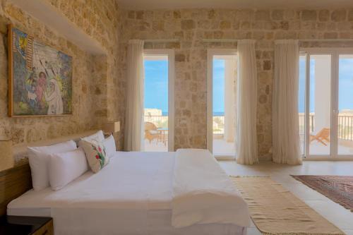 Foto de una habitación de Hotel Wadi Sabarah Lodge