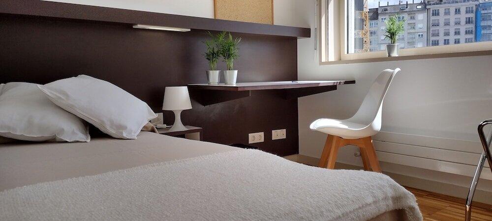 Foto de una habitación de Albergue Hospedería San Froilan