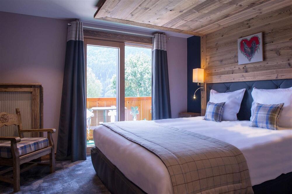 Foto de una habitación de Les Gentianettes Hotel &amp;amp; Spa