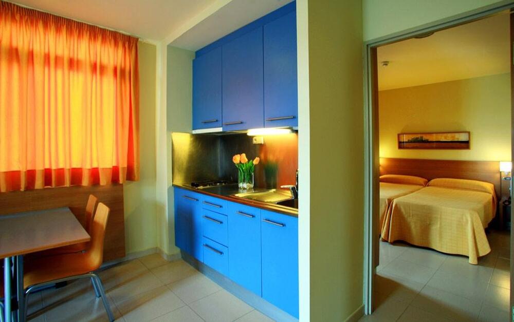 Foto de una habitación de AQUA Hotel Nostre Mar Apartments