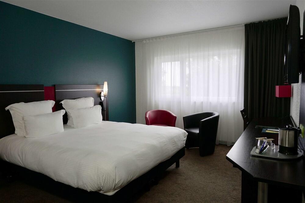 Foto de una habitación de Hotel Golden Tulip Roissy Saint Witz