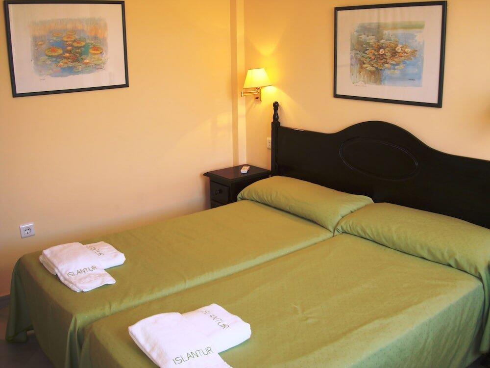 Foto de una habitación de Apartamentos Islantur Ipanema