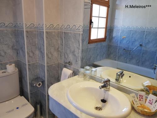 Foto del baño de Hotel Meleiros