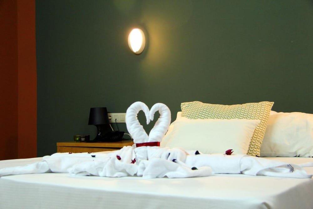 Foto de una habitación de AHC Hoteles