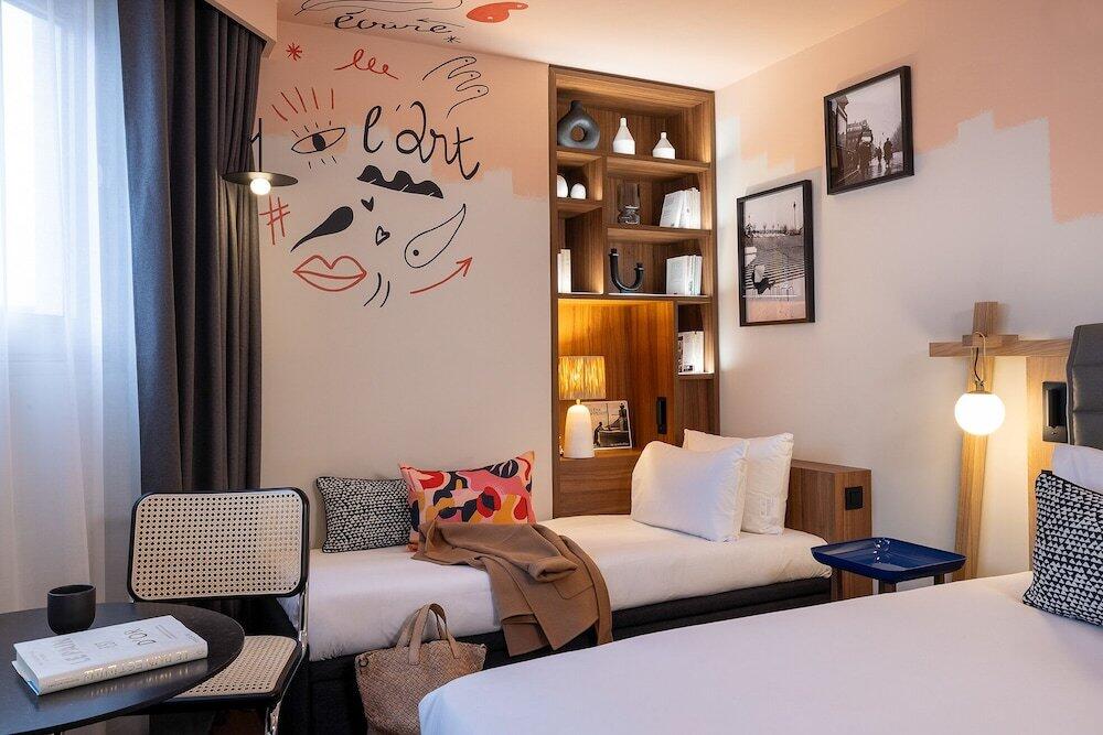 Foto de una habitación de Hotel AROTEL