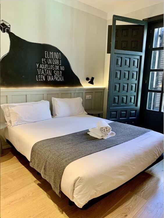 Foto de una habitación de Complutum Hostel