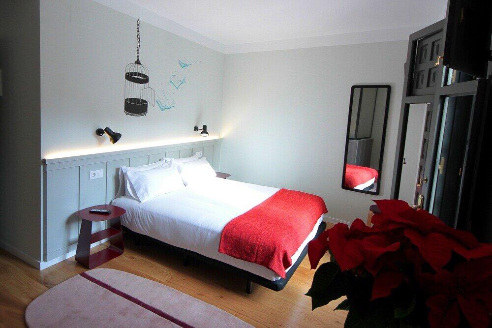Foto de una habitación de Complutum Hostel