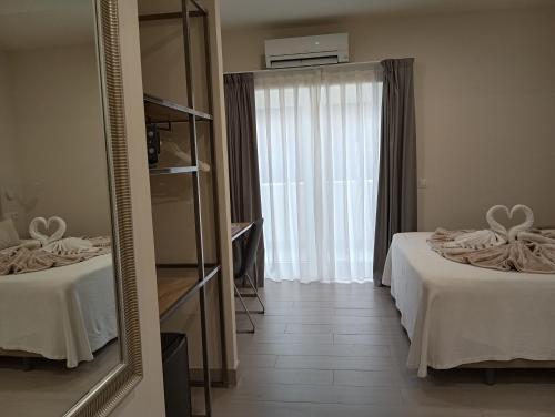 Foto de una habitación de HOSTAL LA ESTACION TERRAZAS