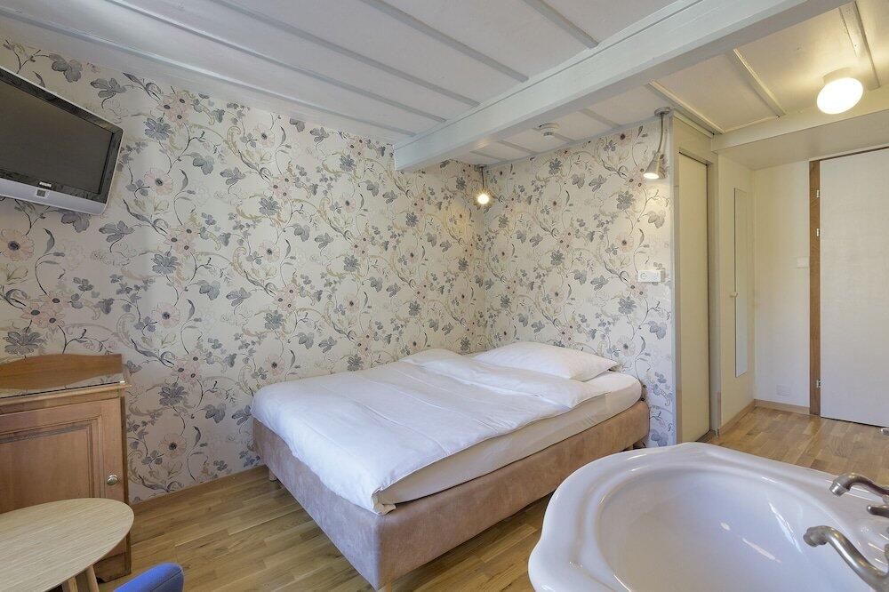 Foto de una habitación de Albergue Alplodge
