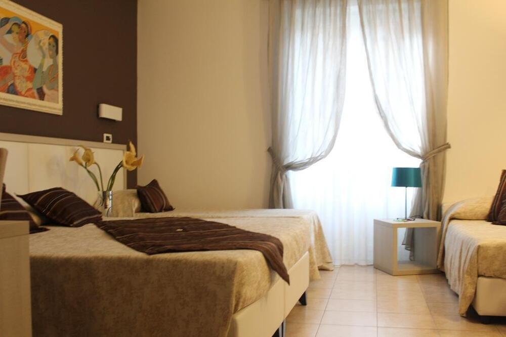 Foto de una habitación de Artemisia Palace Hotel