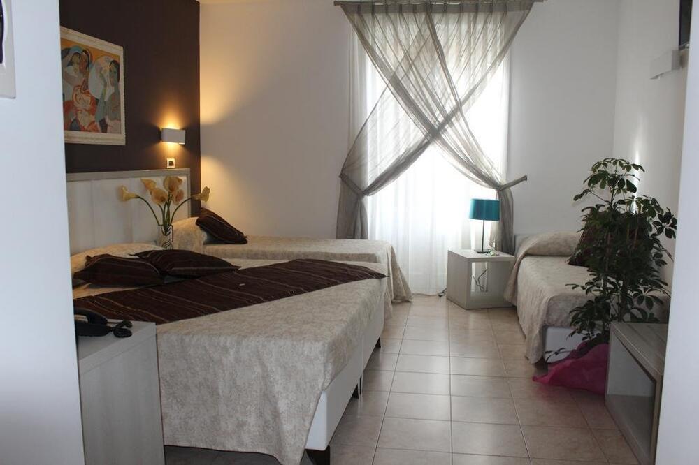 Foto de una habitación de Artemisia Palace Hotel