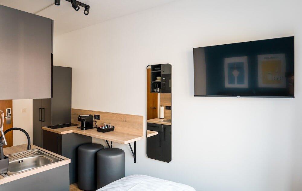 Foto de una habitación de Antares Apartments