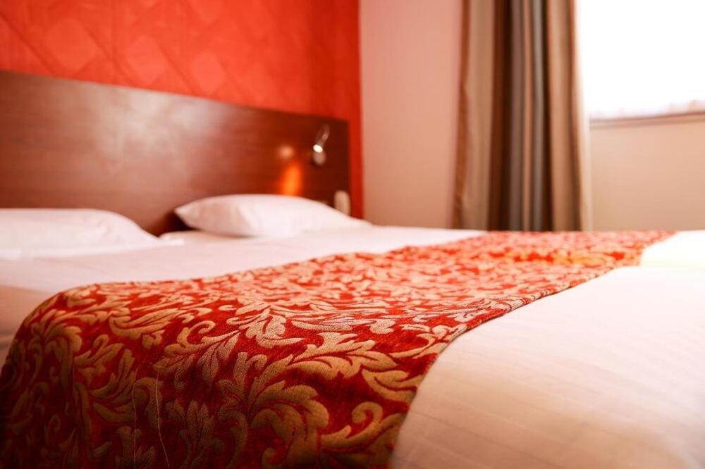 Foto de una habitación de Hotel Plage St Jean