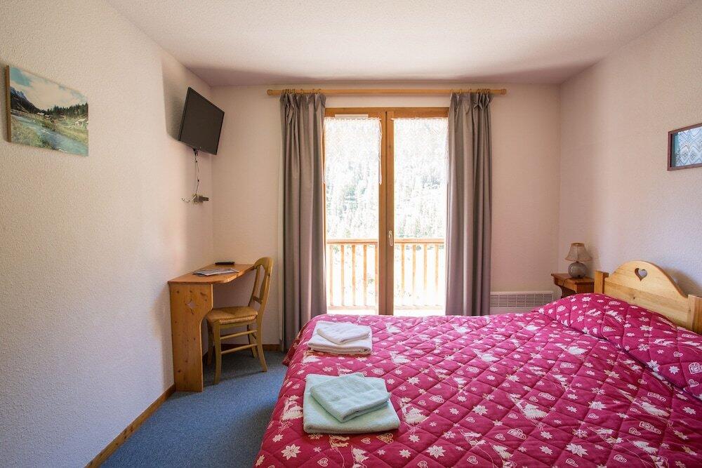 Foto de una habitación de Hôtel L&amp;#039;Echaillon