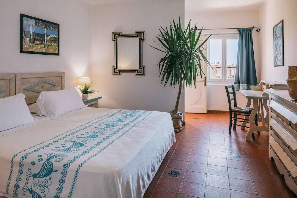 Foto de una habitación de Hotel MClub Marmorata