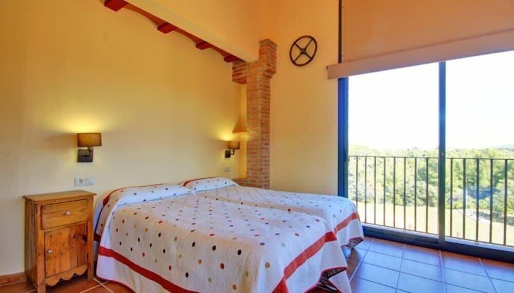 Foto de una habitación de Casa Rural Mas Del Cigarrer Allotjament Rural