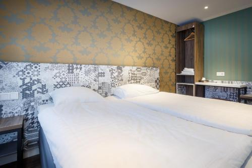 Foto de una habitación de The Old Nickel Hotel