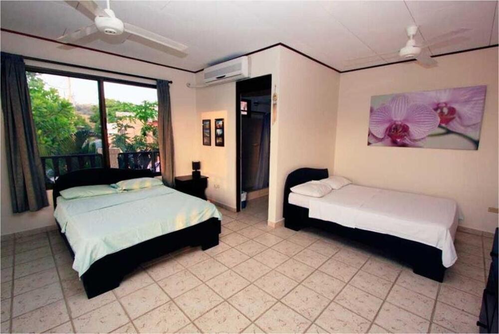 Foto de una habitación de Blue Palm Hotel