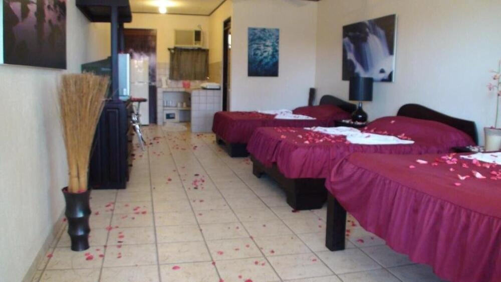 Foto de una habitación de Blue Palm Hotel
