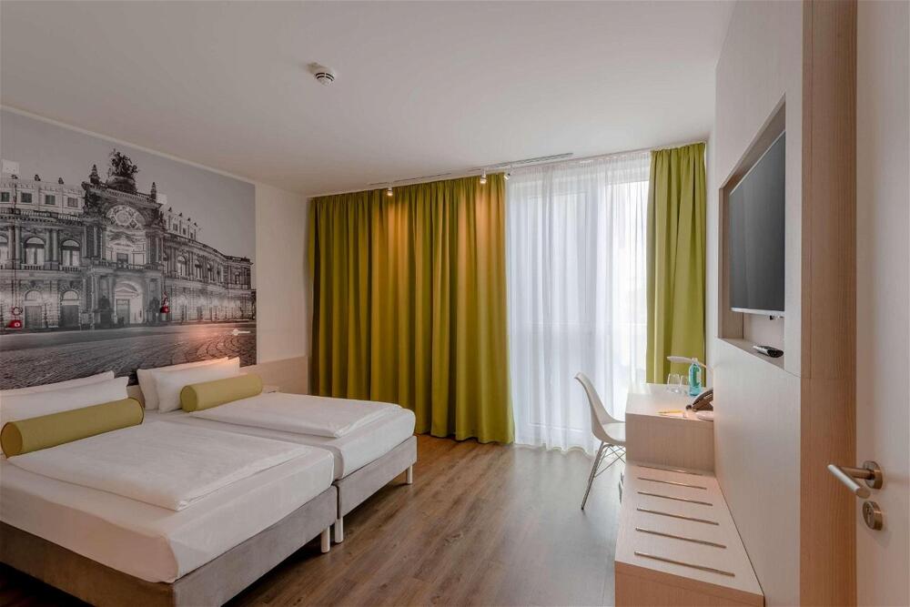 Foto de una habitación de Hotel Super 8 by Wyndham Dresden