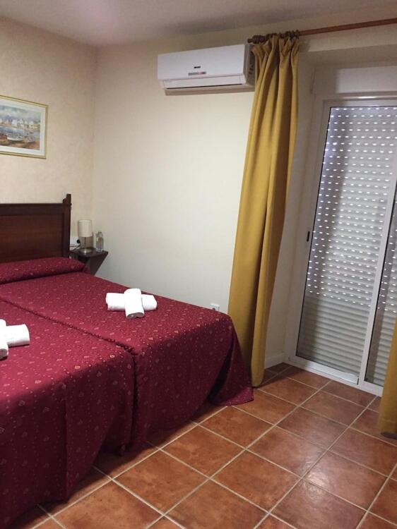 Foto de una habitación de Hotel Carlos V by Viverestays
