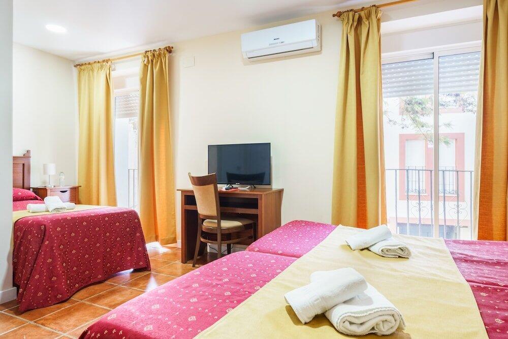 Foto de una habitación de Hotel Carlos V by Viverestays