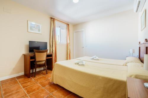 Foto de una habitación de Hotel Carlos V by Viverestays