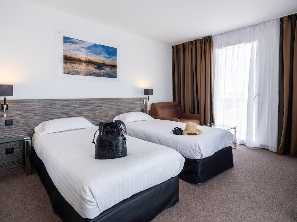 Foto de una habitación de Hotel Golden Tulip La Baule
