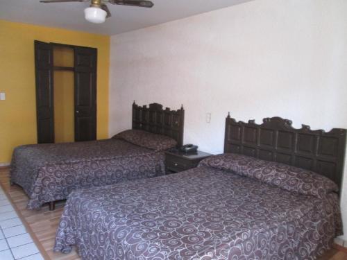 Foto de una habitación de Hotel Colon Express