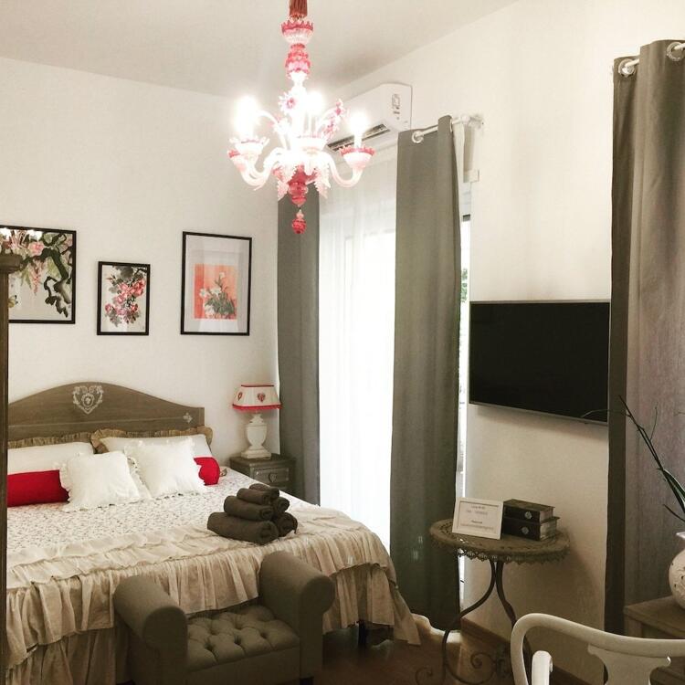 Foto de una habitación de Bed-and-Breakfast La Piazzetta delle Regine