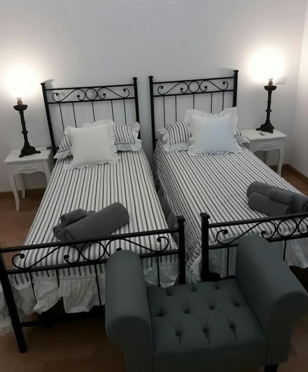 Foto de una habitación de Bed-and-Breakfast La Piazzetta delle Regine