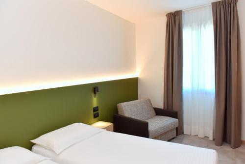 Foto de una habitación de Hotel Casa del Pellegrino