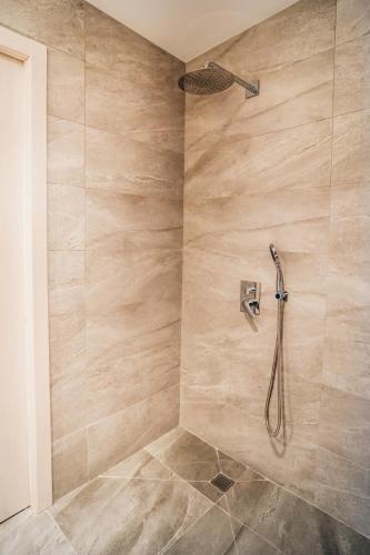 Foto del baño de Arevalos Hotel