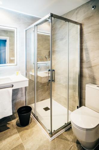 Foto del baño de Arevalos Hotel