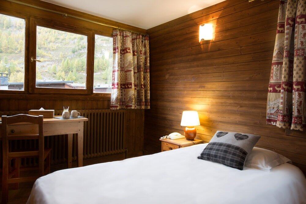Foto de una habitación de Hotel Les Crêtes Blanches