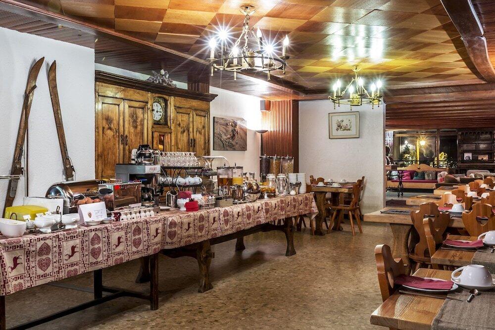 Foto de restauración de Hotel Les Crêtes Blanches