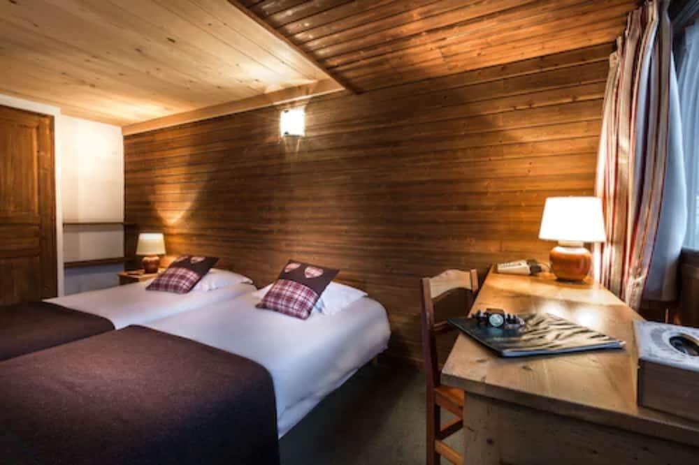 Foto de una habitación de Hotel Les Crêtes Blanches
