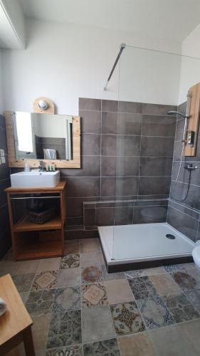 Foto del baño de Hôtel La Baïne