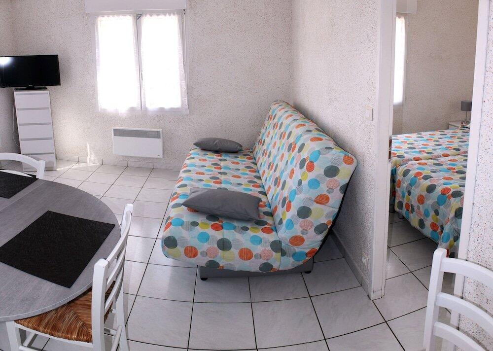 Foto de una habitación de Hôtel Résidence Les Flots