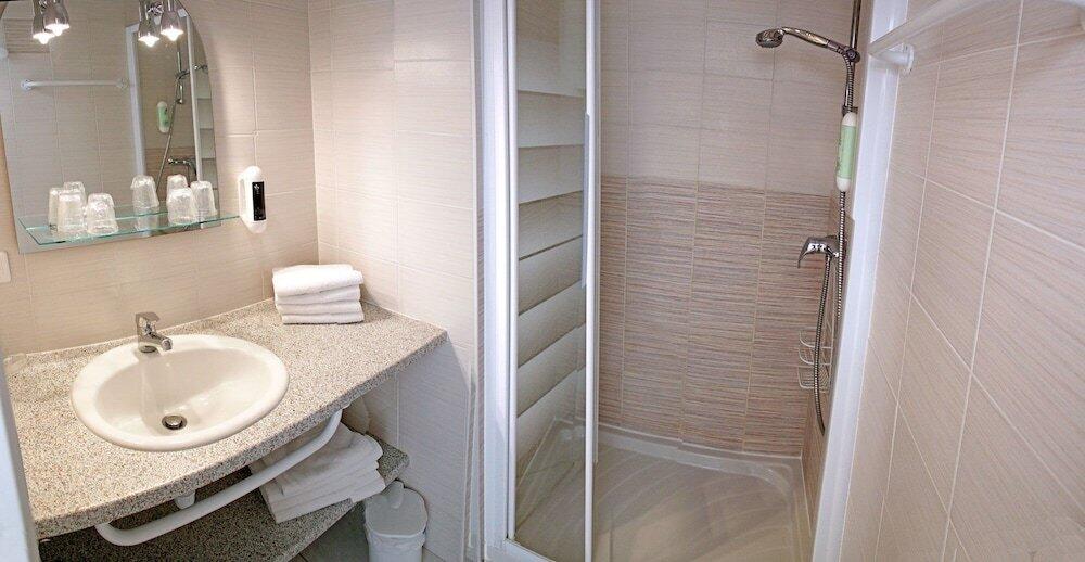 Foto del baño de Hôtel Résidence Les Flots