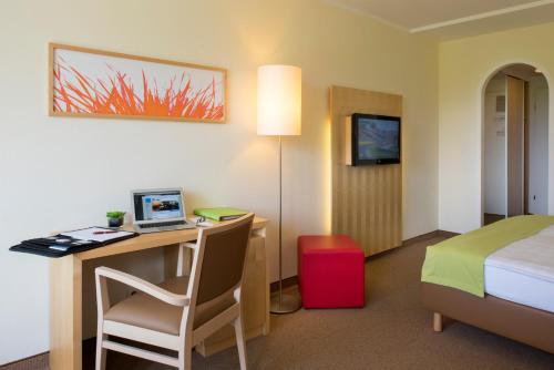 Foto de una habitación de Momentum Hotel