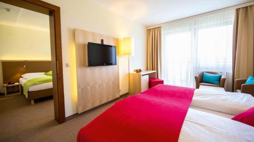 Foto de una habitación de Momentum Hotel